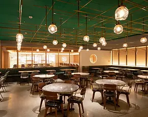 Modern farm-to-table restaurant and bar at GOOD NATURE STATION, serving creative dishes made from local ingredients and promoting natural dining.