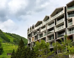 A refined ski-in/ski-out sanctuary offering panoramic views, private rotenburo baths, and curated wellness in the heart of Hirafu.