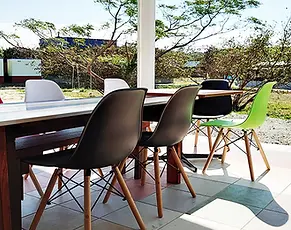 A scenic oceanfront café in Itoshima serving coastal-inspired Western and Japanese dishes with panoramic sea views and a gentle island breeze.