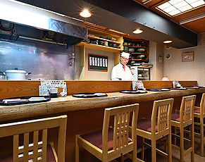 A refined Sapporo sushi restaurant specializing in omakase courses made with seasonal seafood and precise, traditional techniques.