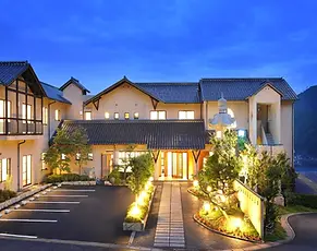 Seaside hot spring ryokan in Ine offering ocean-view baths, fresh seafood kaiseki, and tranquil views of the Sea of Japan.