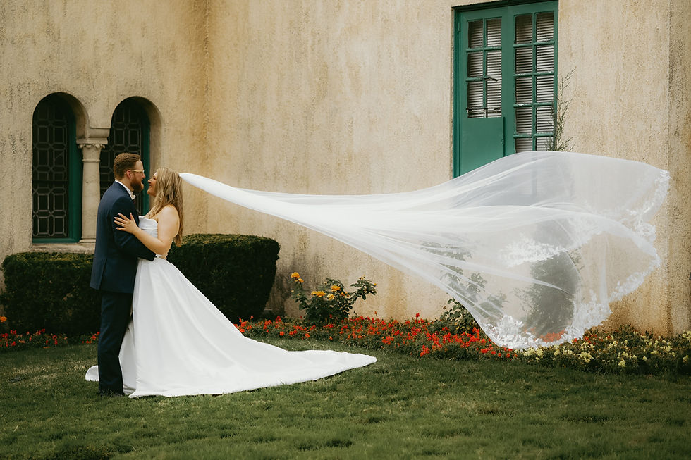 Bride and groom with flowing veil wedding photography near me