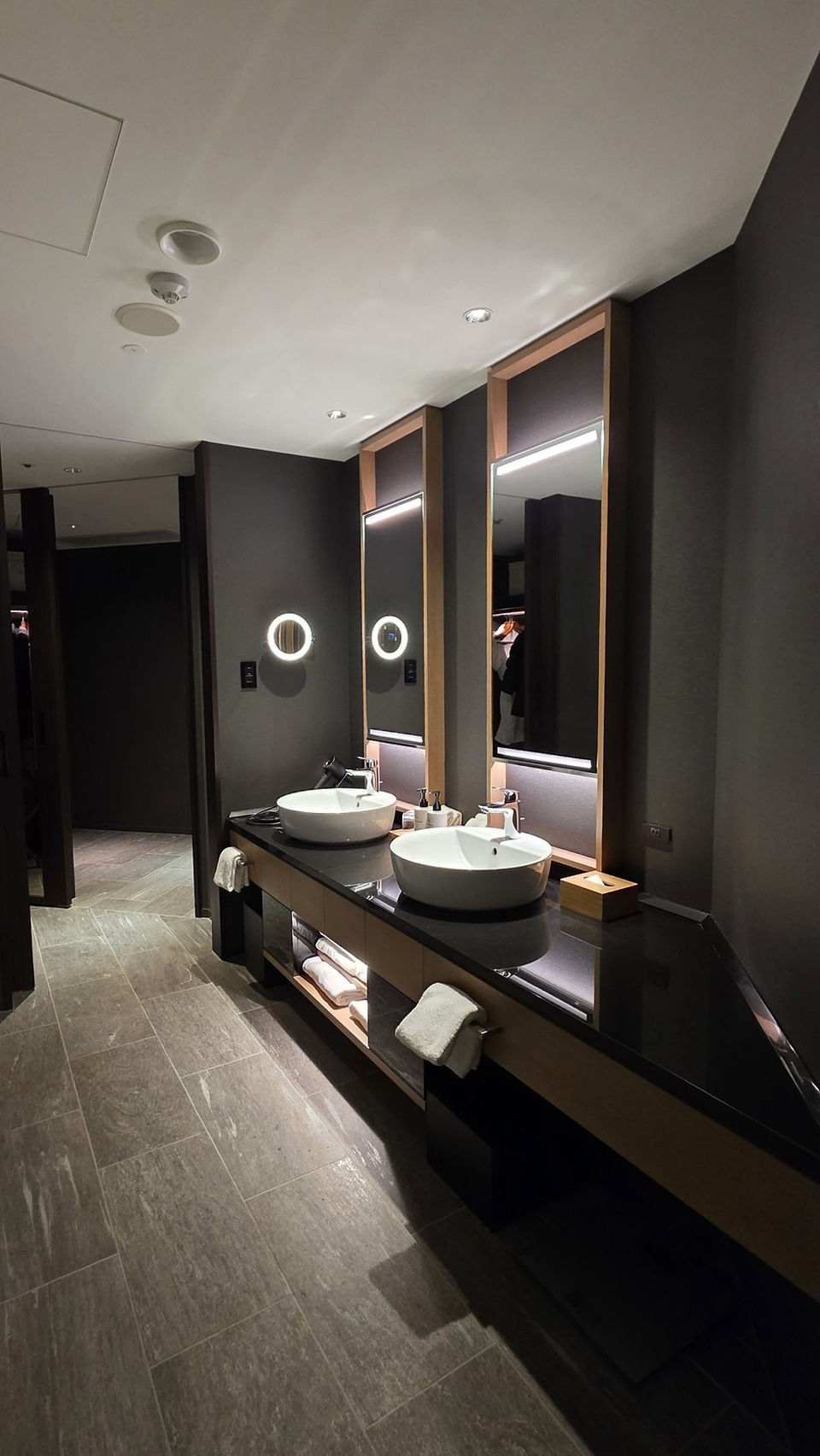 Bathroom with double sinks and bathtub