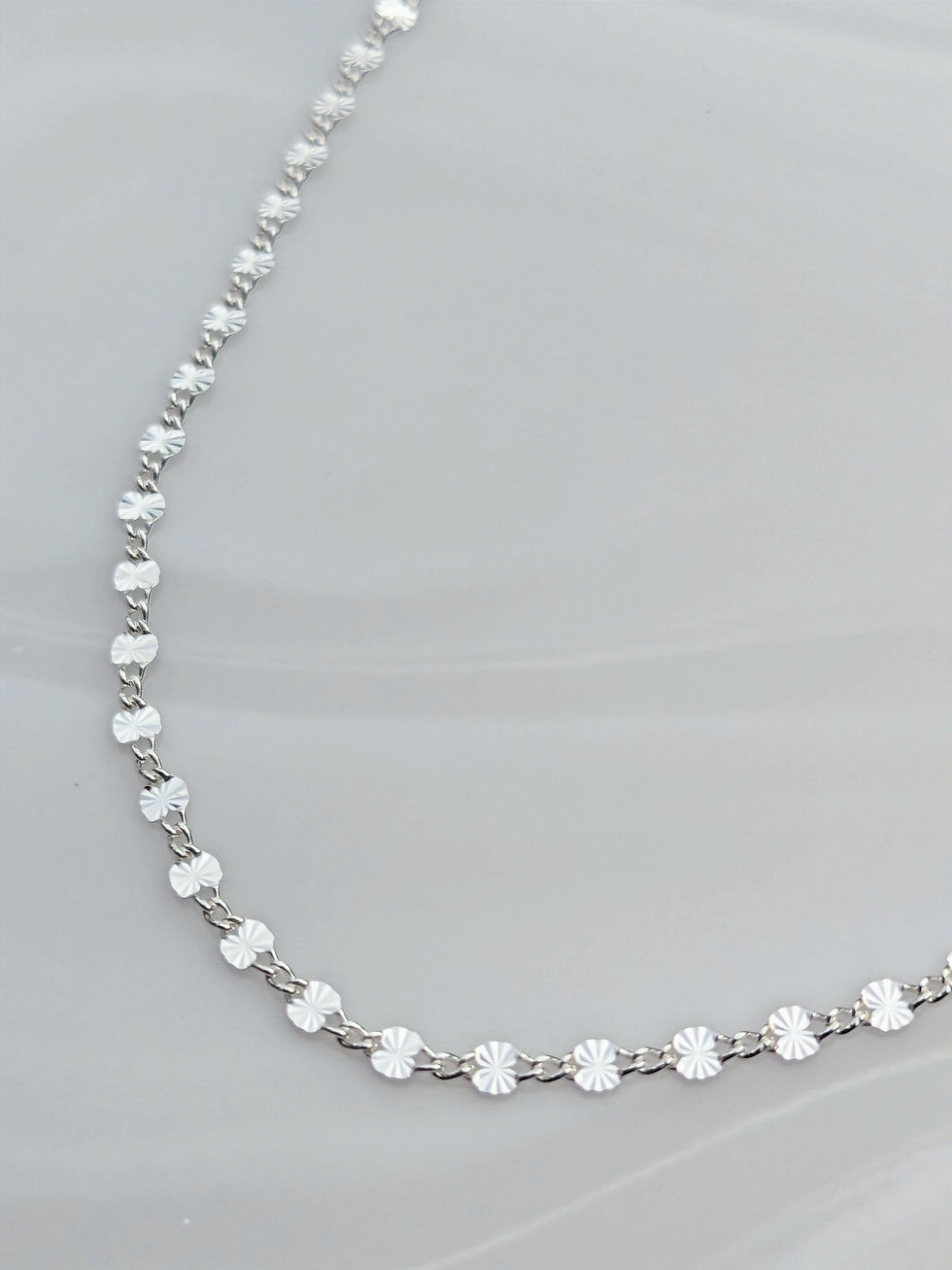 Silver starburst chain jewellery