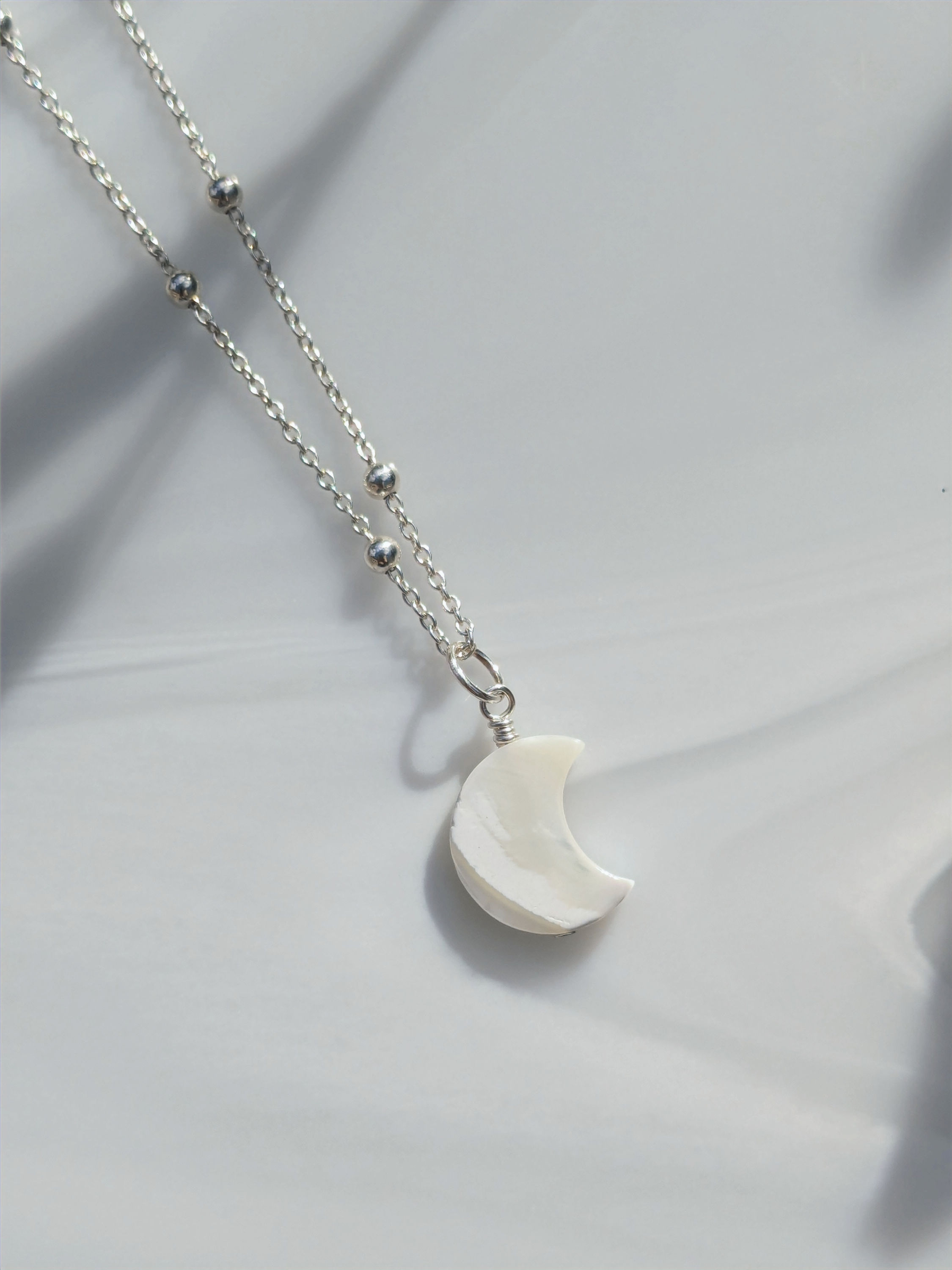 Mother of pearl moon necklace in silver
