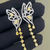 Thumbnail: 18K Yellow Gold Butterfly Tassel Earrings with Natural Yellow and White Diamonds