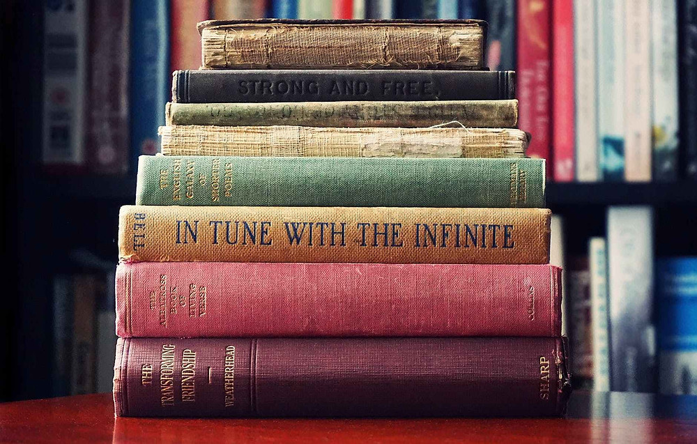pile of assorted books