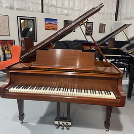 1920's Steinway Model M in a dark walnut finish. Completely cleaned and regulated and ready for sale.