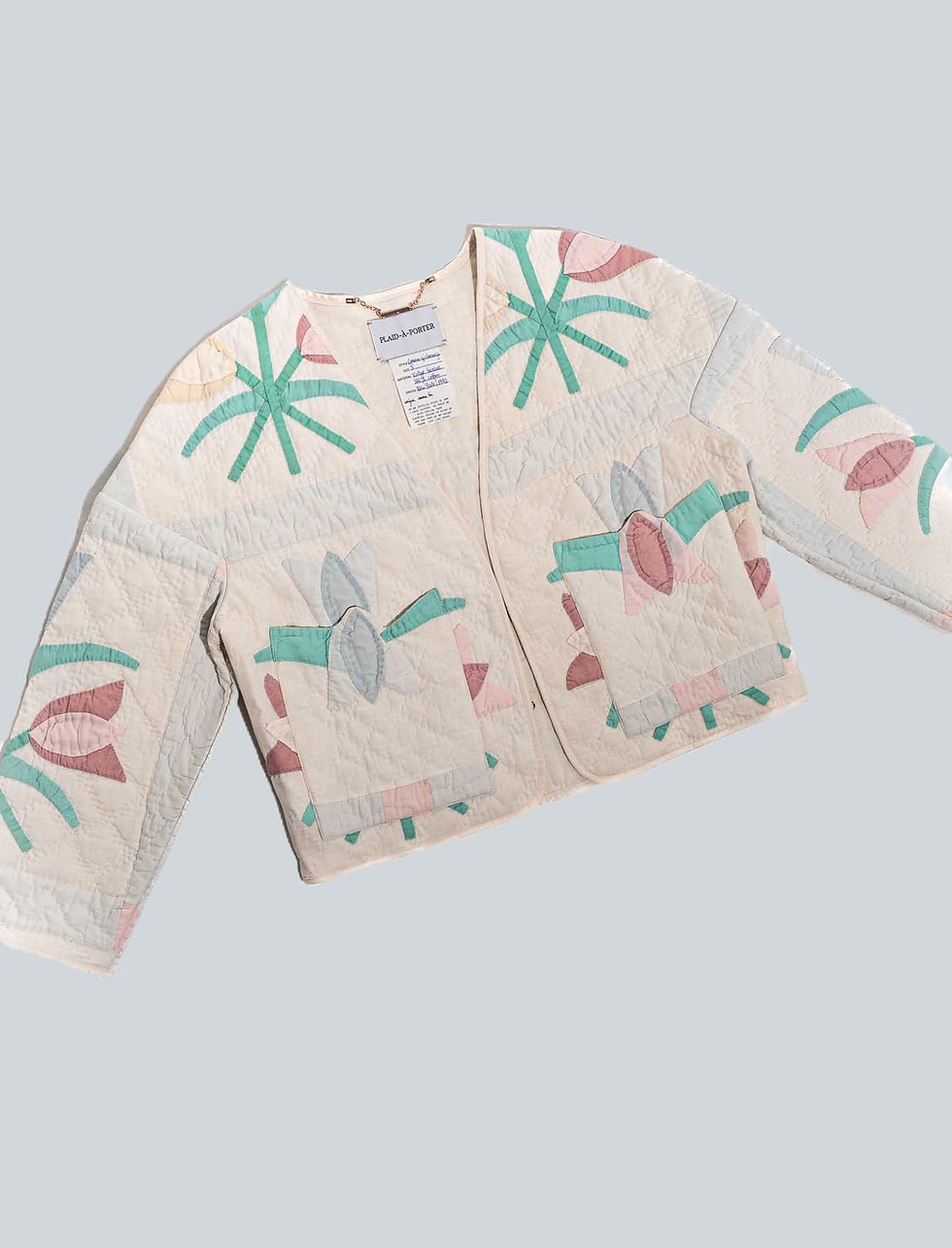 Miniaturbild: Kurze Patchwork Jacke für Damen aus Vintage Patchwork Quilt mit pastellfarbenen Tulpen, Voderansicht