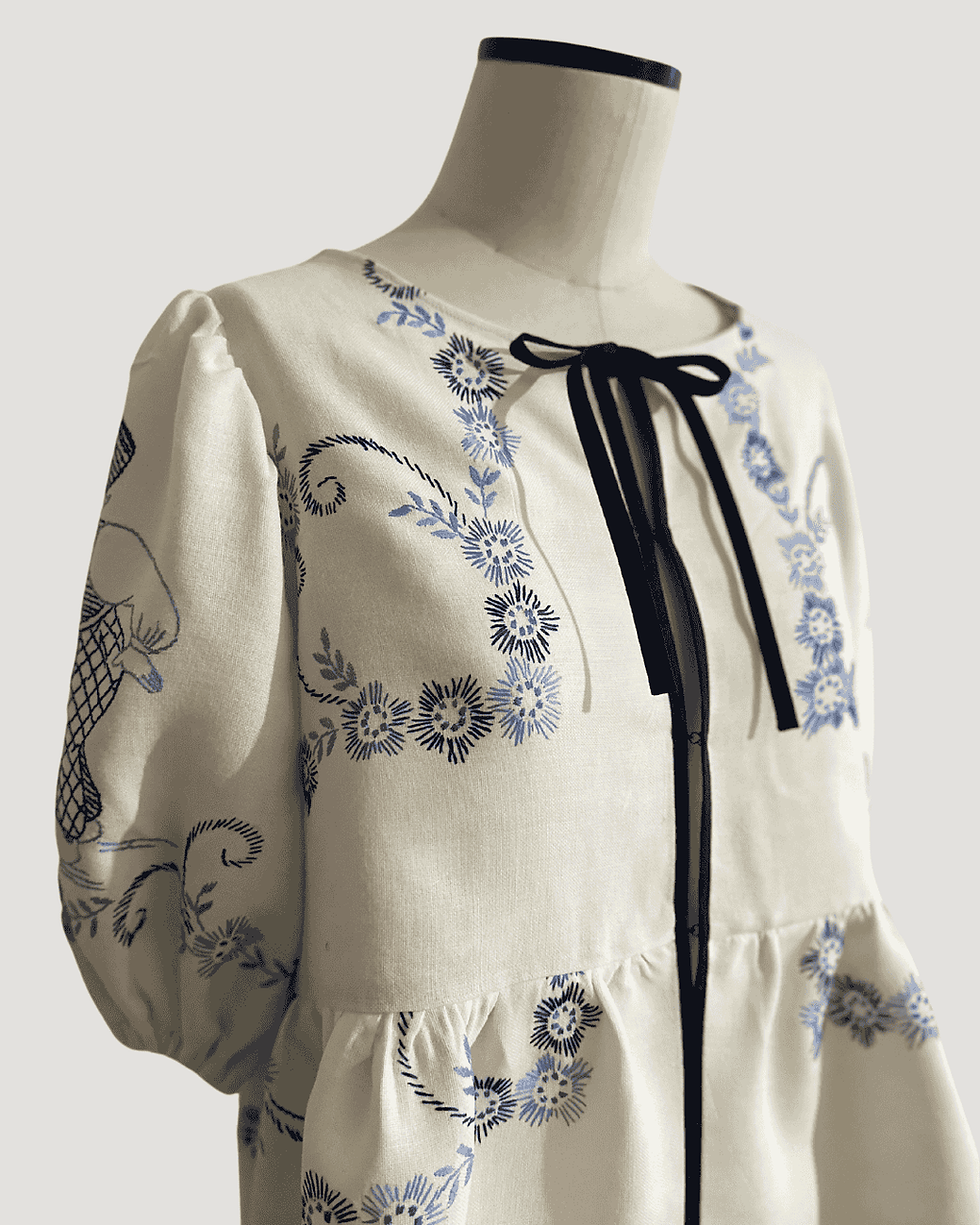 Miniaturbild: Bestickte Bluse mit Puffärmeln und Schleife "Holland Kiss"