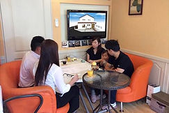 home building consultation with family