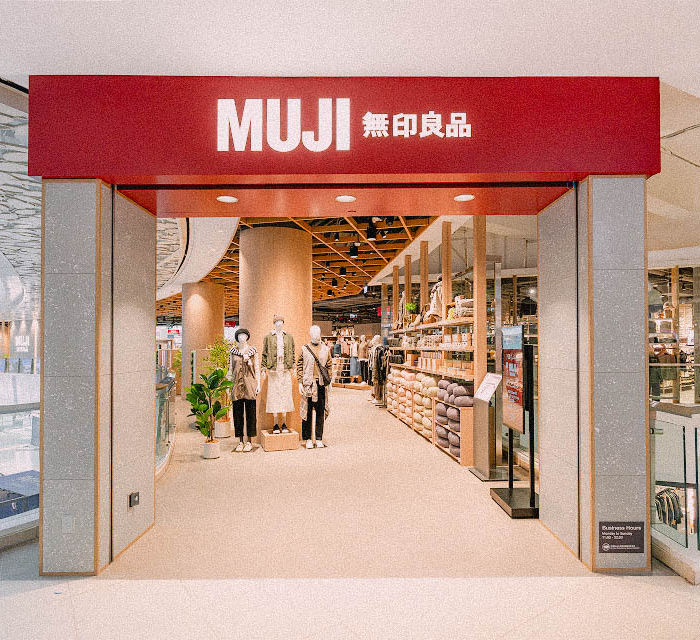 V Cycle produced custom decorative panels from recycled plastic for the front entrances of the Kwun Tong APM MUJI branch. These sheets transformed post-consumer waste into a visually striking installation, creating an immediate statement on sustainability for every customer entering the store.