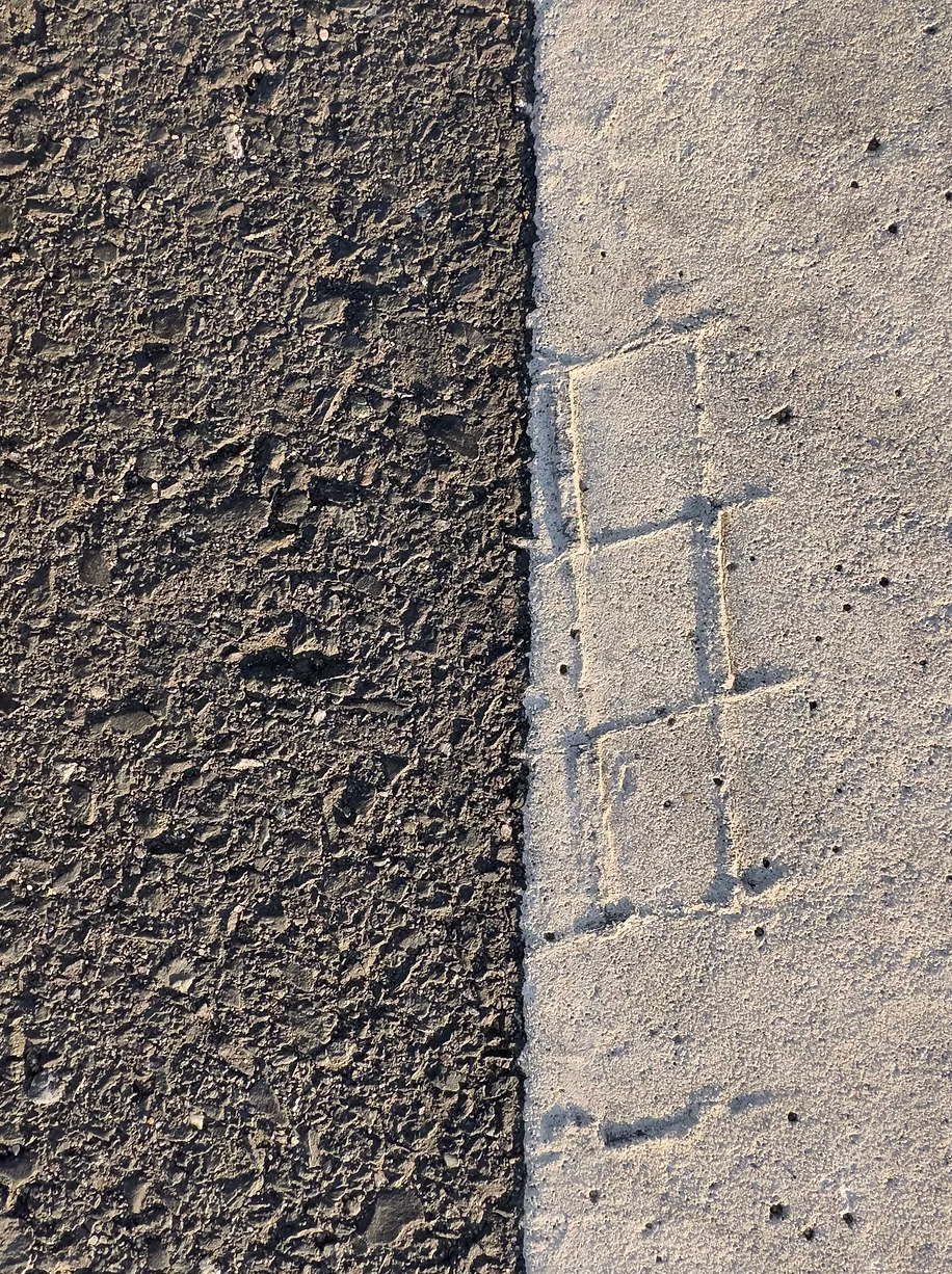 black and white half and half painted asphalt with hashtag symbol