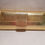 Thumbnail: 018.  Gold croc effect clutch bag.