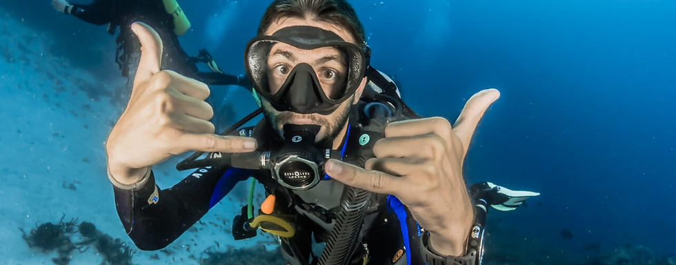 Happy scuba diver underwater
