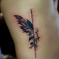 Tattoo of an own and a spear