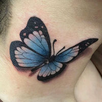 Tattoo of a blue butterfly