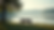 Eye-level view of a quiet lakeside with a single wooden bench