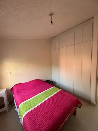 Recámara principal con closet en casa Las Garzas