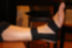 foot with athletic tape