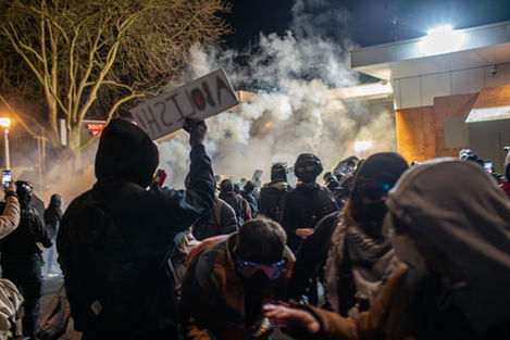 Hundreds of people protest in front of the Portland ICE facility in the South Waterfront Sunday, Feb. 1, 2026.