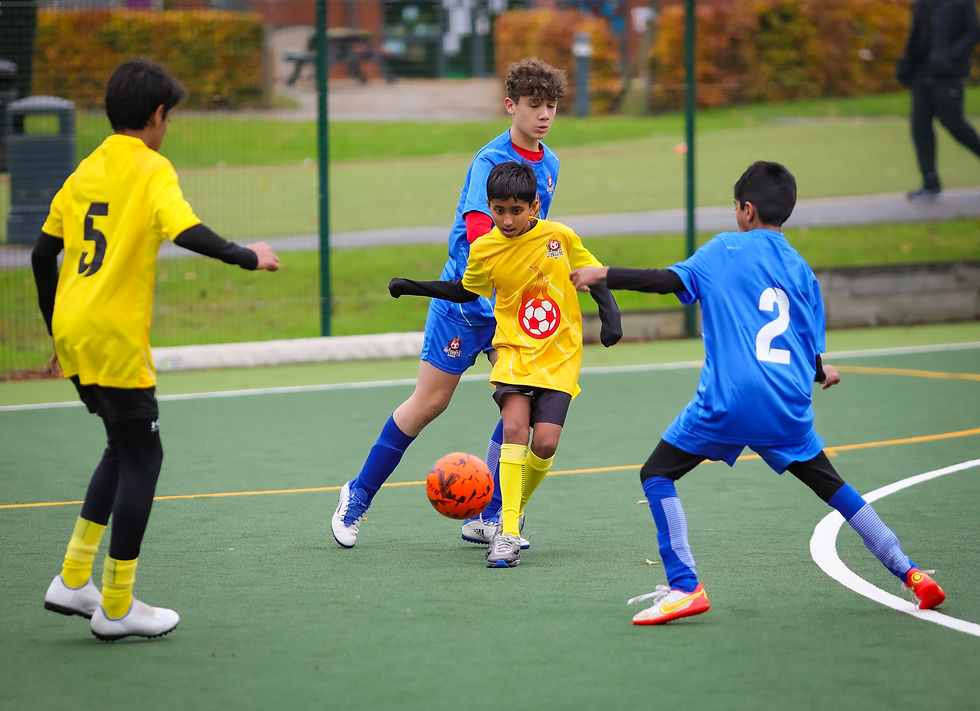 Hotshots League players celebrating together after a school football game
