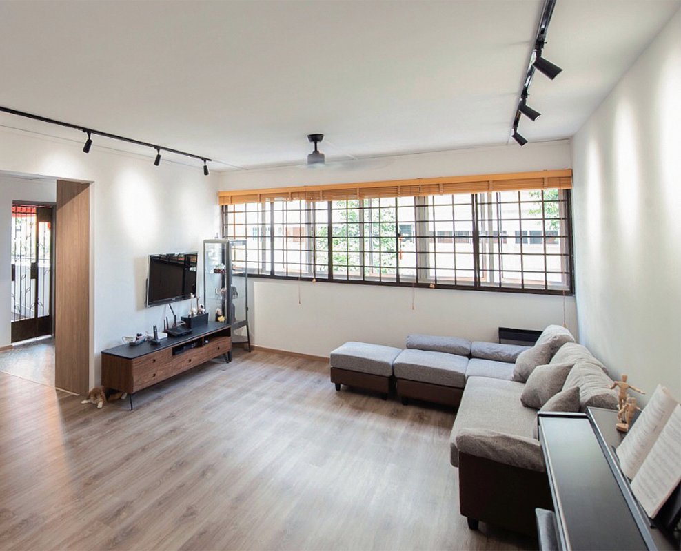 Contemporary interior boasting wood elements, creating a warm and classic look. This interior makes use of a good mix of different finishes and shades in the form of furniture and vinyl flooring, adding visual depth and interest.