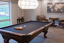 Rack ’em and crack ’em! Our game room features pool and other social diversions.