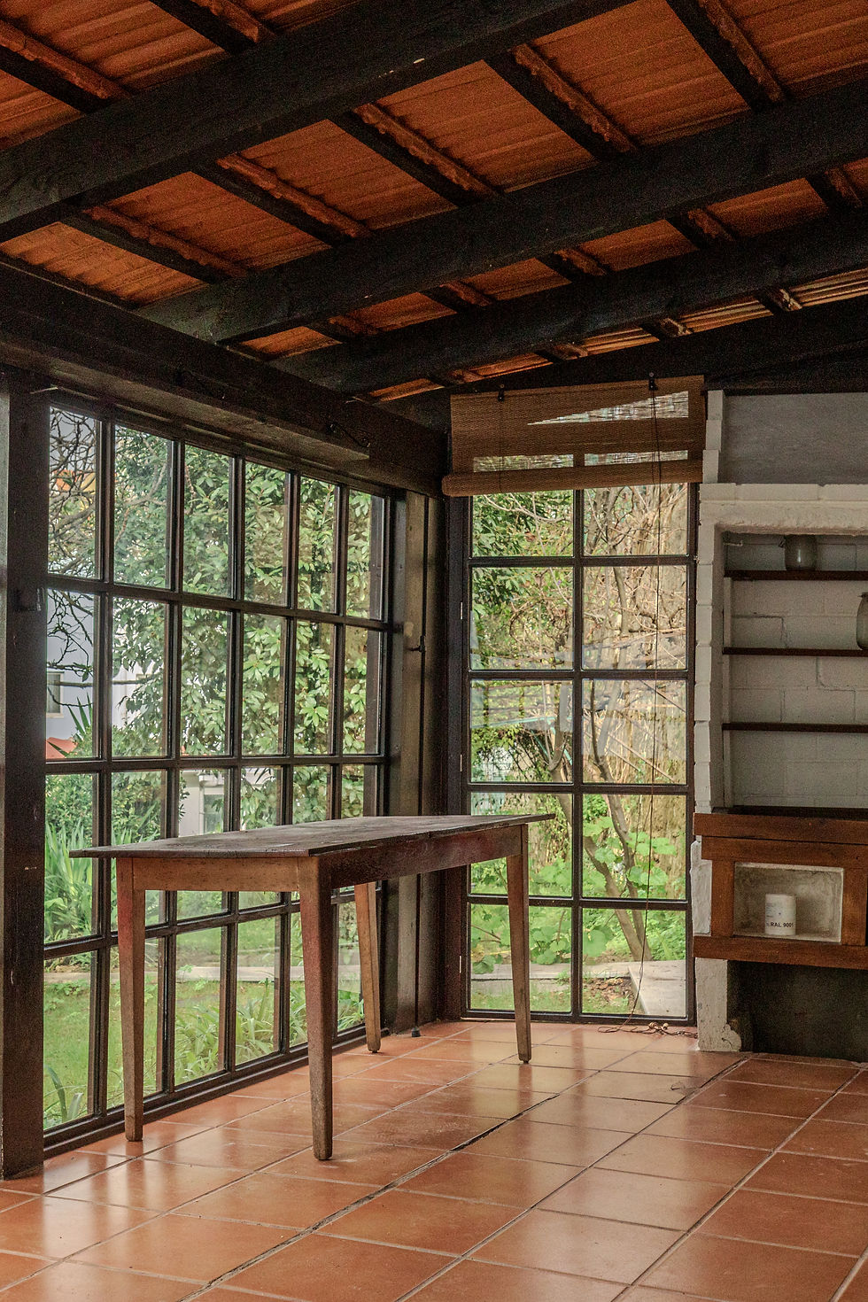 Glass doors opening onto a garden terrace