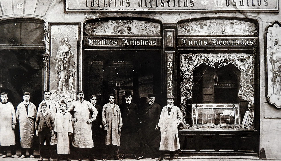 Historic photograph of a Maumejean stained-glass shopfront with its craftsmen