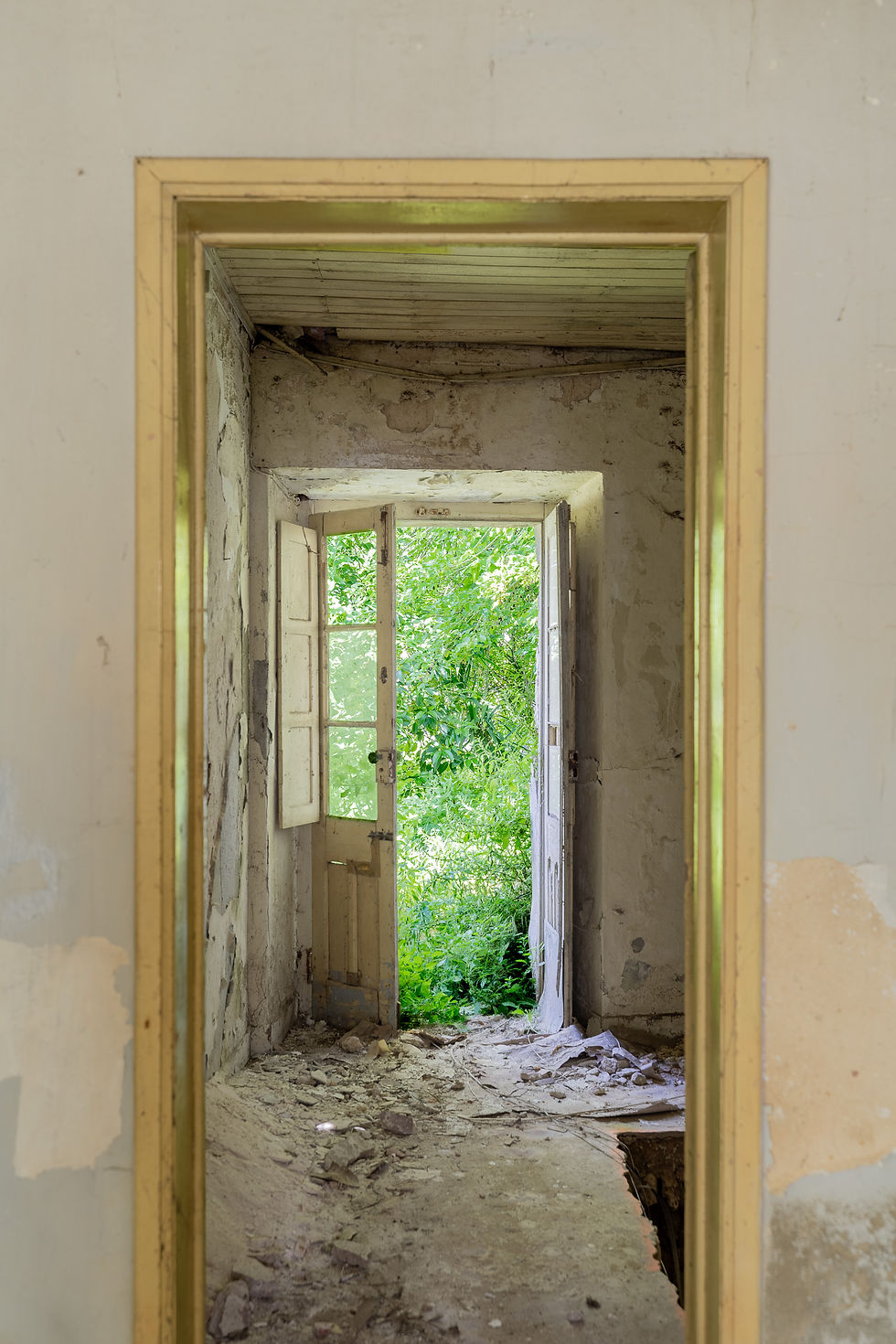 Old timber window in a house awaiting rehabilitation in Azeitão, Portugal