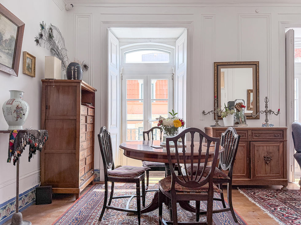Drawing room with French doors in an Art Nouveau apartment in Lisbon