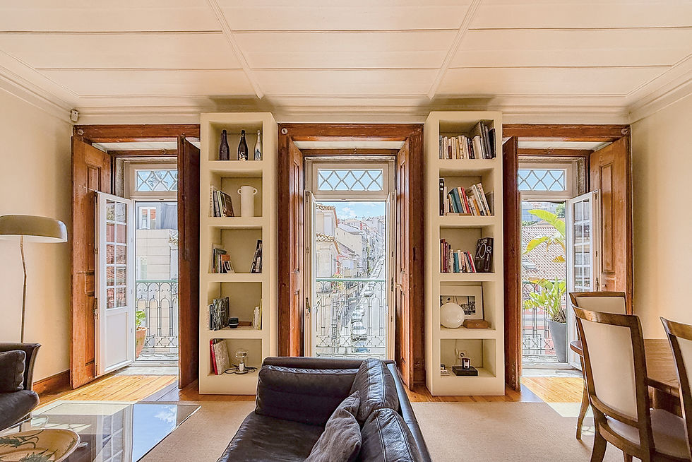 Library with bookshelves and window seat
