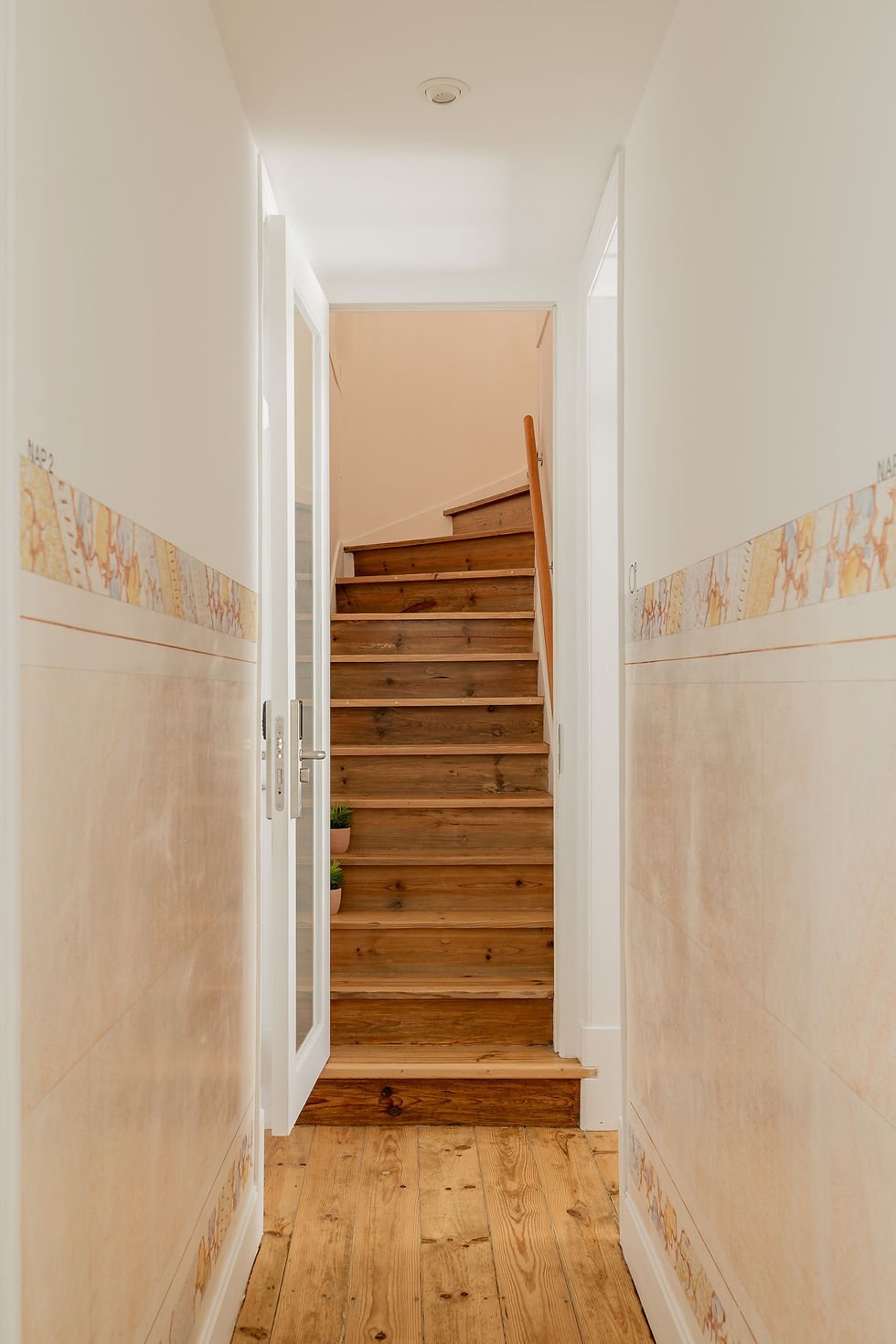 Timber floor and panelled walls in a restored house in the historic centre of Abrantes