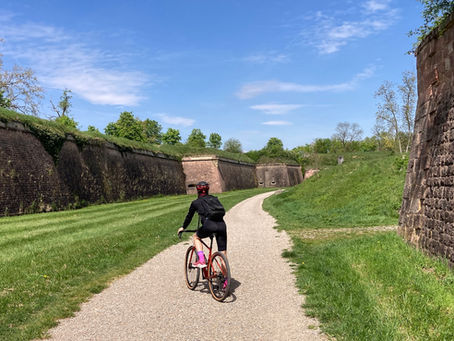 A cyclist on the path around Neuf-Brisach walls