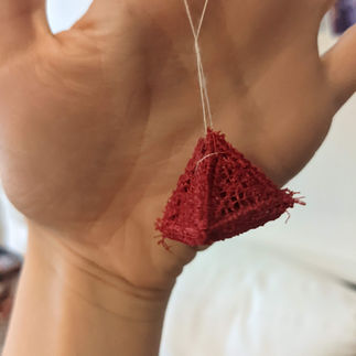 Fully made lace pyramid ornament