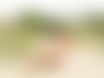 Delaware Family of Four Cuddling at Delaware's Cape Henlopen State Park