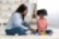 aba therapist & child.webp