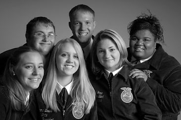 Six smiling NC FFA state officers from the 2000s