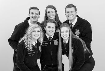 Six smiling NC FFA state officers from the 2010s