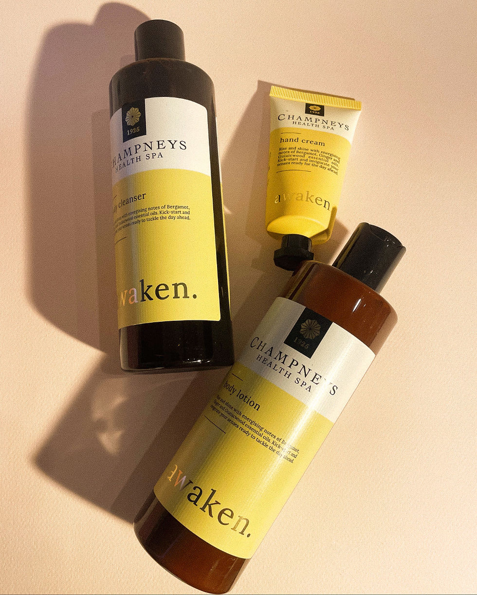 champneys awaken spa products flat lay with shadows packaging design