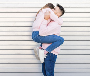 young-man-holding-slim-woman.jpg