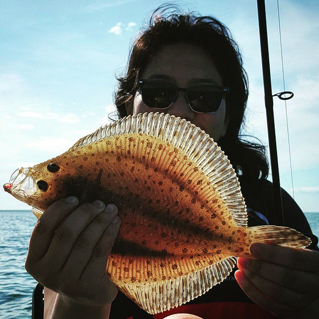 Helen with a windowpane flounder.