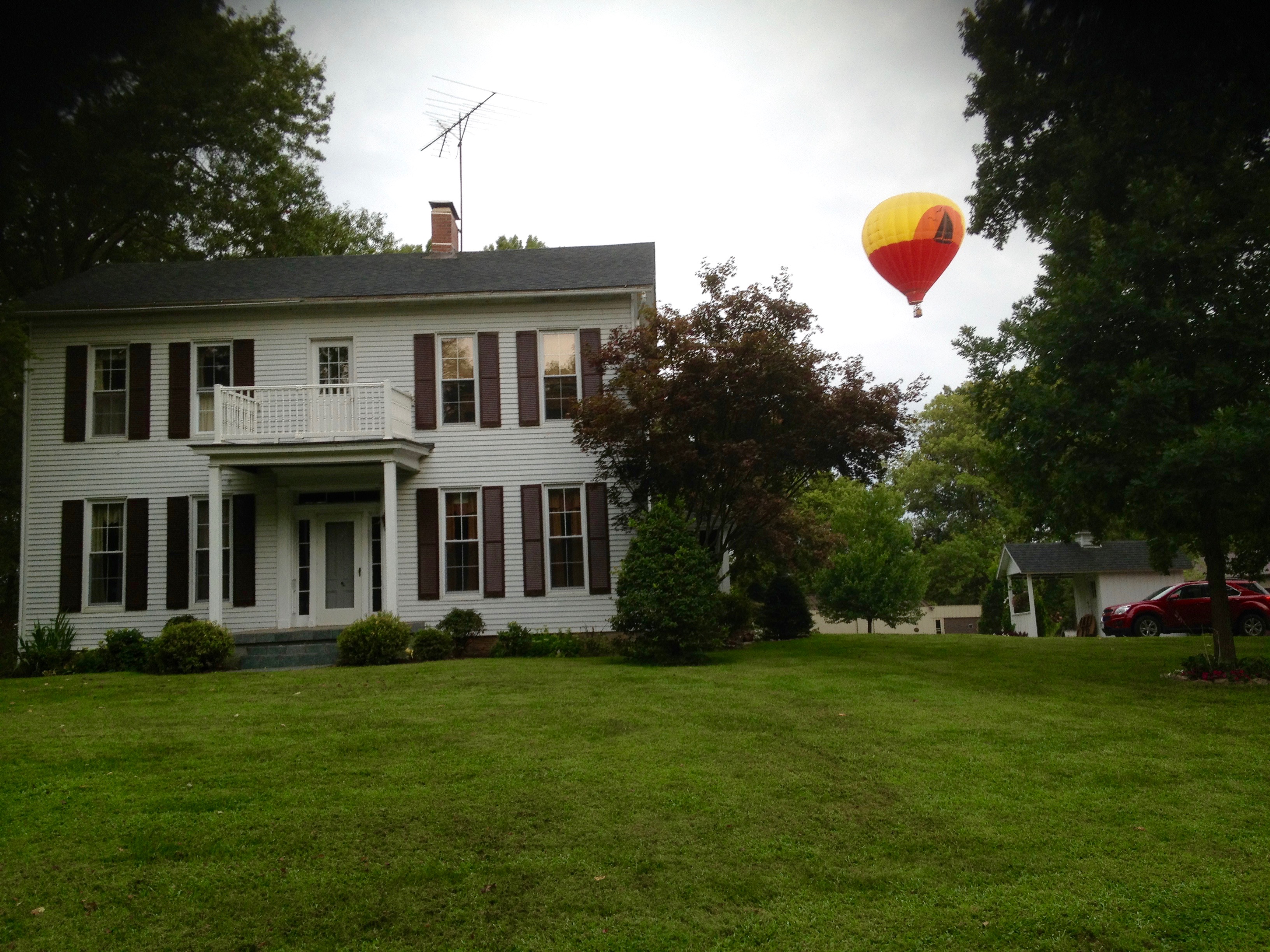 Balloon over park house