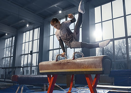 little-male-gymnast-training-gym-flexible-active.jpg