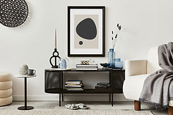 stylish-living-room-interior-design-with-console-armchair-mock-up-poster-frame-candles-gem