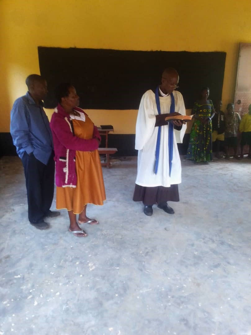 Church leader conducts a blessing