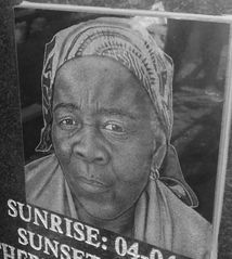 Engraved tile
tombstone engraving
engraved photo