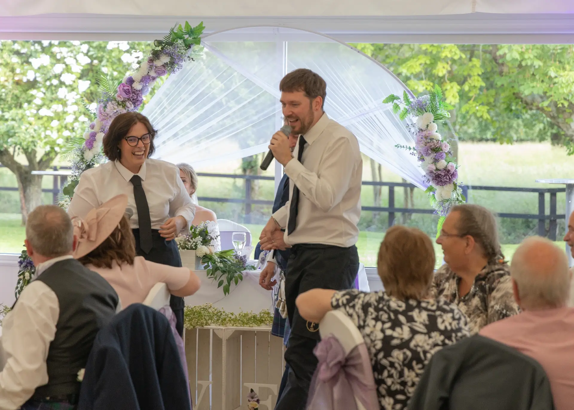 Singing waiters entertain wedding guests at The Fennes