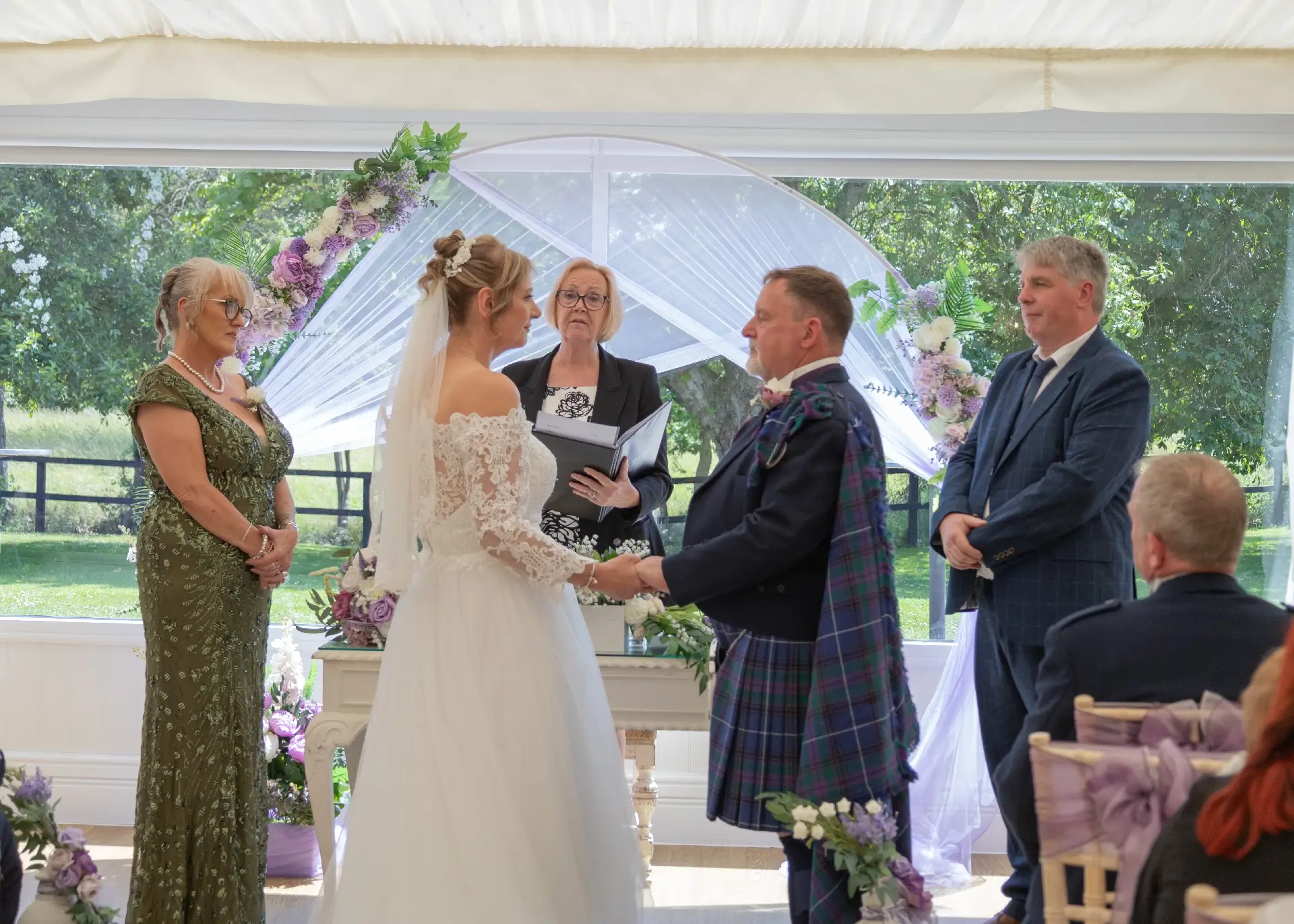 Indoor summer wedding ceremony at The Fennes